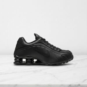 Nike Shox R4 na co dzień, czarne buty unisex z pomarańczowym akcentem, wygodna amortyzacja w pięcie, AR3565-004