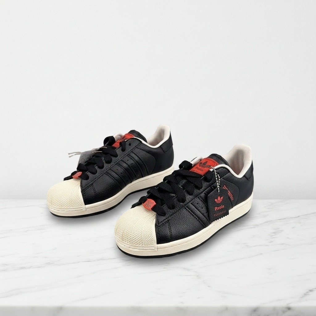 Adidas Superstar na co dzień, sneakersy unisex czarno kremowe, skóra, wygodna guma, JQ3223