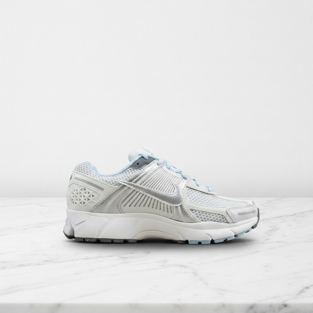 Nike Zoom Vomero 5 na co dzień, kolorystyka Ocean Bliss, wygodne sneakersy unisex, biel i błękit, pianka amortyzująca FN3432-001