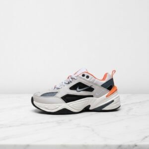 Buty Nike M2K Tekno dla Ciebie, wygodne na co dzień, beż z pomarańczowym akcentem, unisex, pasują do codziennych stylizacji CI2969-001