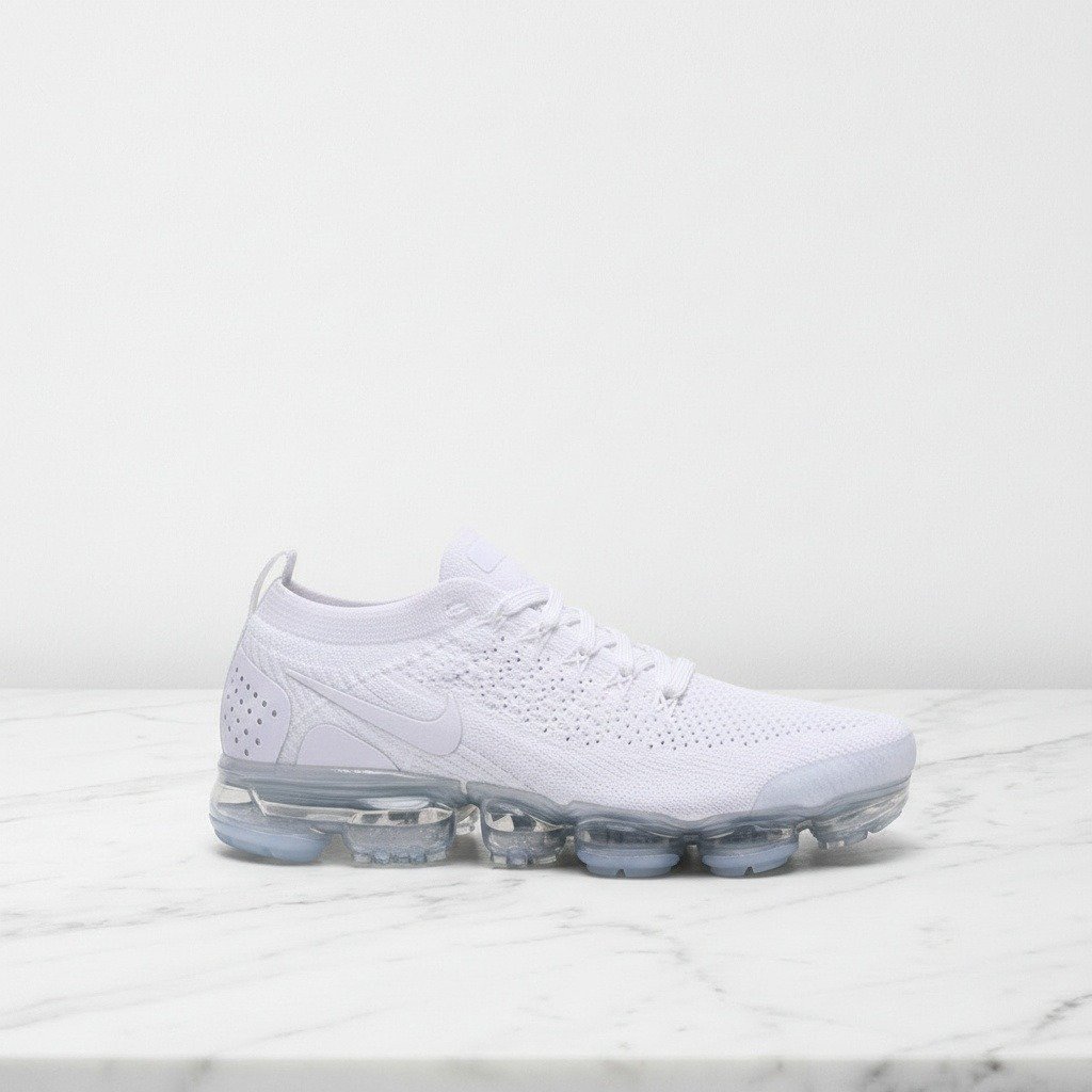 Białe sneakersy Nike Air VaporMax Flyknit 2, wygodne na cały dzień, lekka dziana cholewka, unisex, pasują do wielu stylizacji 942842-100